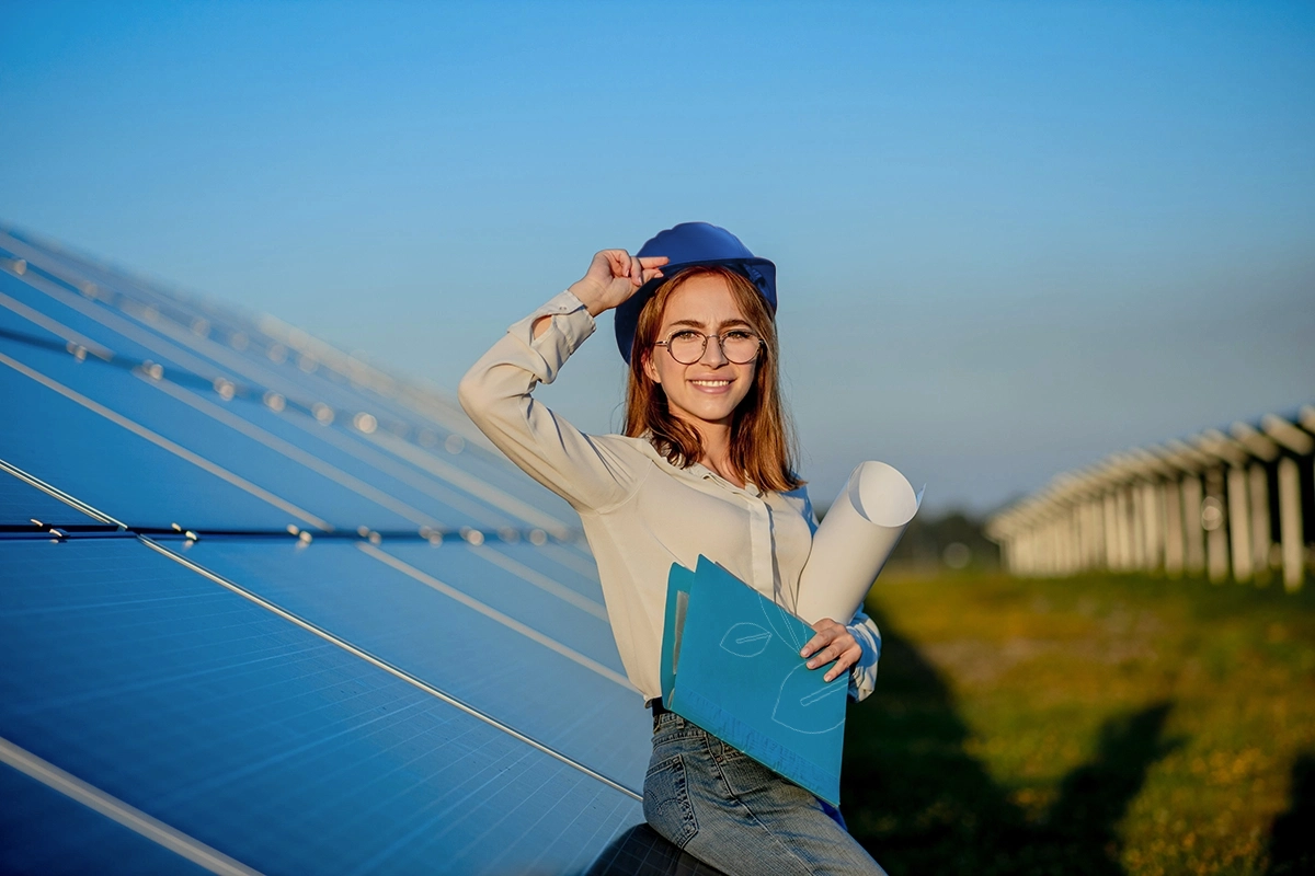 businesswomen-working-checking-equipment-solar-power-plant-with-tablet-checklist